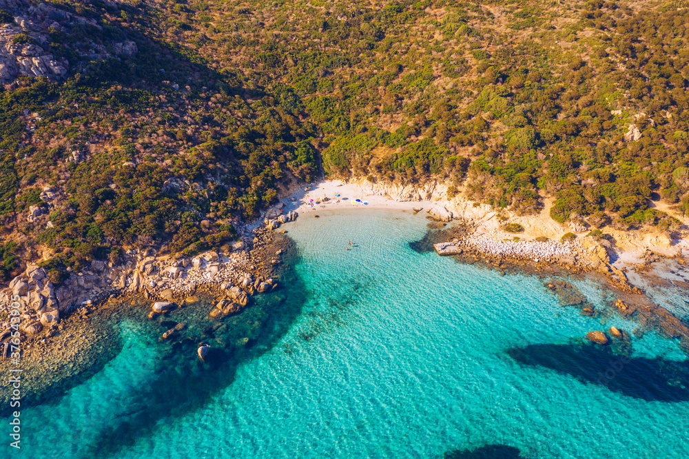 Panoramic view of sandy beach and sea with azure water, in Villasimius, Sardinia (Sardegna) island, Italy. Holidays, the best beaches in Sardinia. Porto Giunco beach, Villasimius, Sardinia.