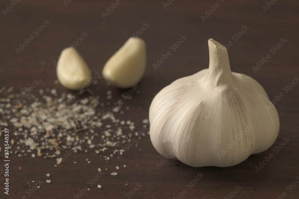 Close-up of garlic on a wooden table Close-up of garlic on a wooden table