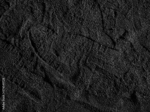 A close up of a black coal texture  dark coal background