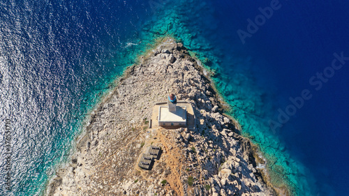 Aerial drone photo of iconic lighthouse in scenic Cape Matapan or Tainaron the Southest part of mainland Greece, Mani, Peloponnese, Greece photo