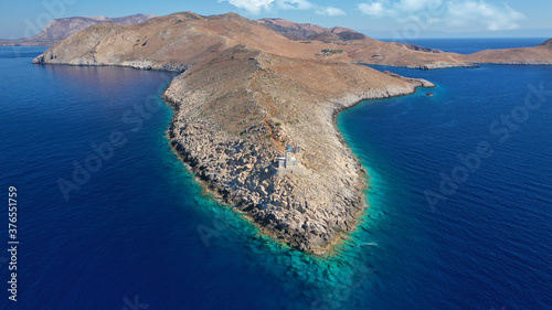 Aerial drone photo of iconic lighthouse in scenic Cape Matapan or Tainaron the Southest part of mainland Greece, Mani, Peloponnese, Greece