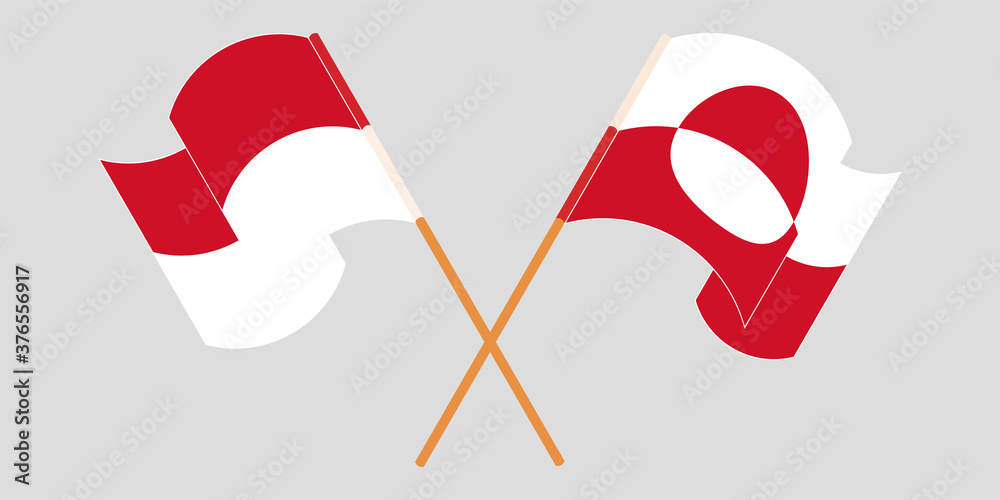 Crossed and waving flags of Greenland and Indonesia Crossed and waving flags of Greenland and Indonesia