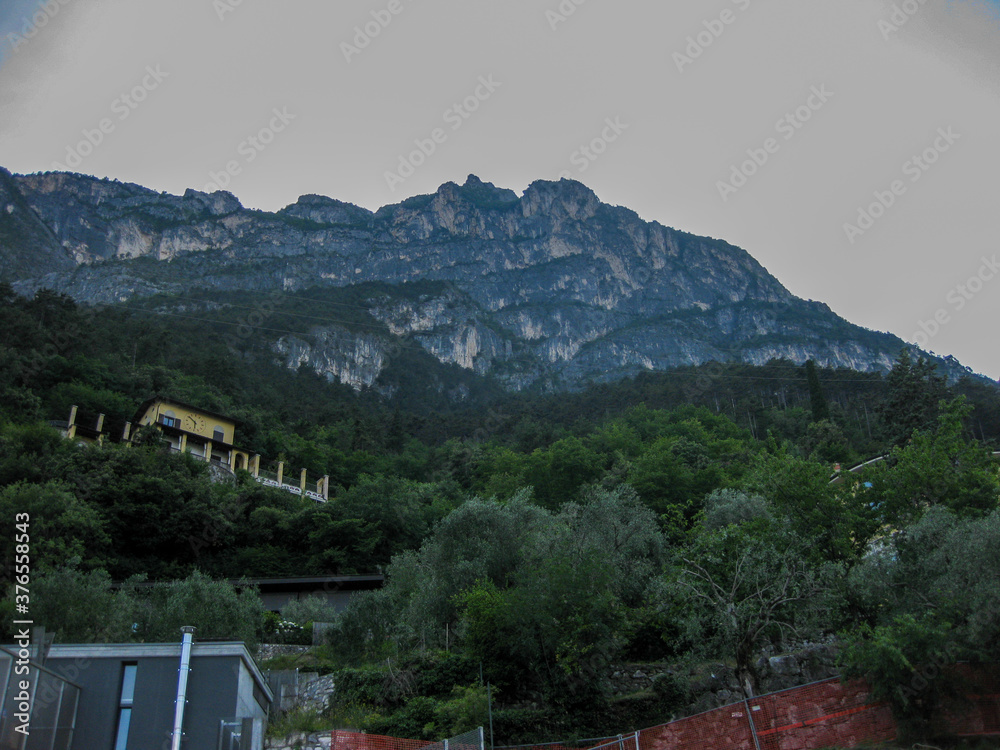 panoramic view of mountains at the garda lake, city of Arco, northern italy panoramic view of mountains at the garda lake, city of Arco, northern italy