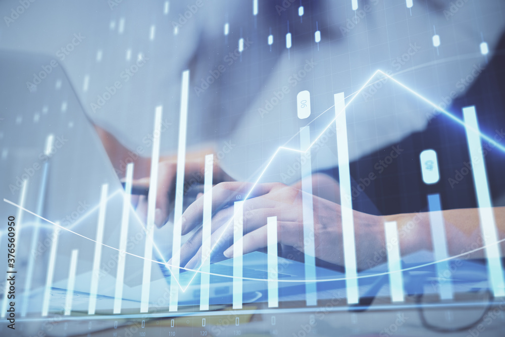 Multi exposure of woman hands typing on computer and financial graph hologram drawing. Stock market analysis concept. Multi exposure of woman hands typing on computer and financial graph hologram drawing. Stock market analysis concept.
