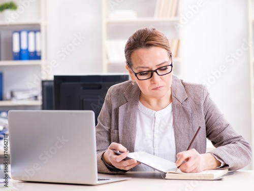 Businesswoman employee working in the office