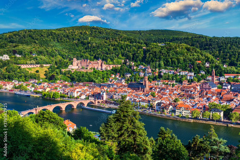 Landmark and beautiful Heidelberg town with Neckar river, Germany. Heidelberg town with the famous Karl Theodor old bridge and Heidelberg castle, Heidelberg, Germany. - obrazy, fototapety, plakaty 