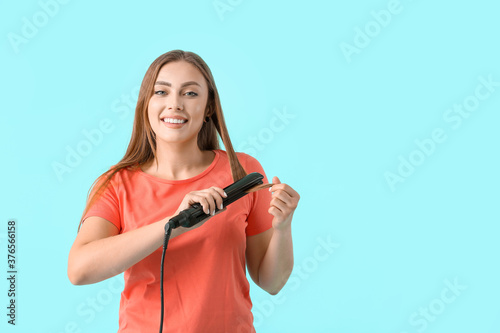 Young woman with straighten...