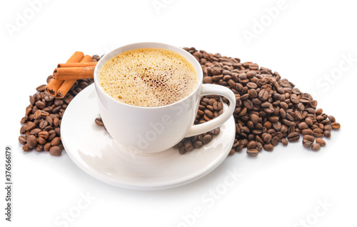 Cup of hot coffee and beans on white background © Pixel-Shot