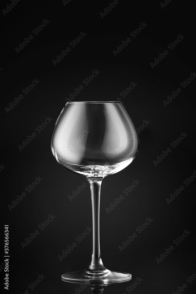 Empty glass on dark background Empty glass on dark background
