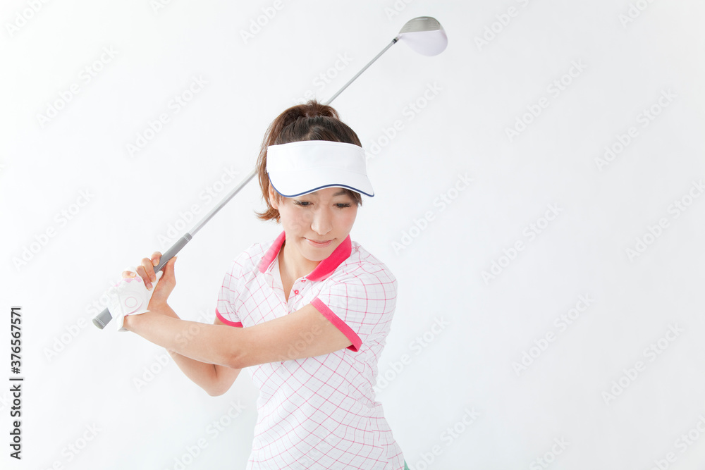 ドライバーを構える女性 ドライバーを構える女性