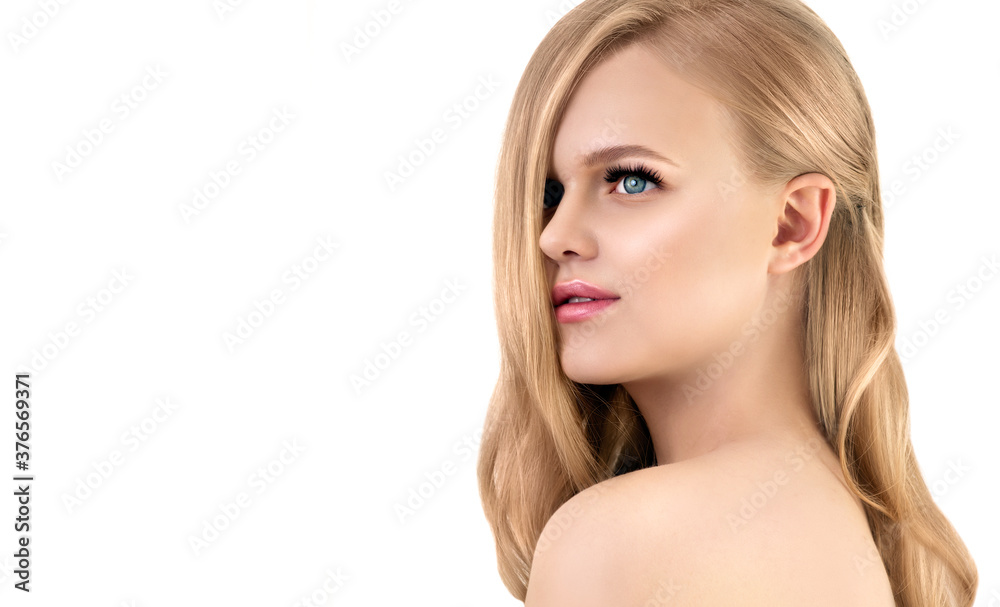 Portrait of Beautiful Fashion Model with Natural Make up with Long Eyelashes and Long Blonde Wavy Hair. Portrait of Beautiful Fashion Model with Natural Make up with Long Eyelashes and Long Blonde Wavy Hair.