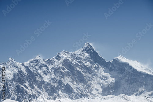mountain peak against a blue sky