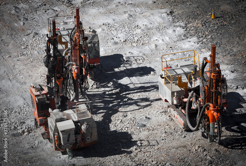Obraz na płótnie Drilling machine makes bore holes for explosives in open cast mine