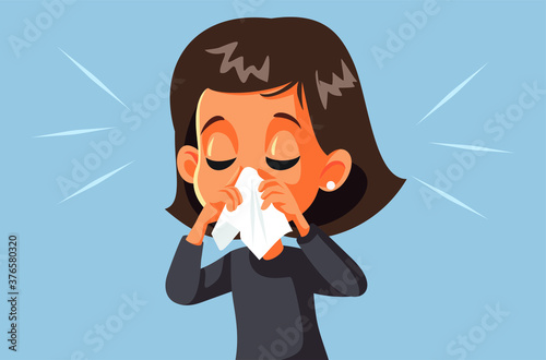 Sick Girl Blowing Her Nose Having the Flu