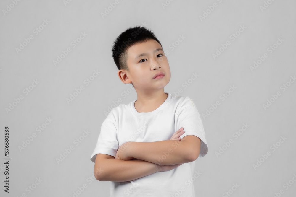 Asian boys studio portrait on gray background