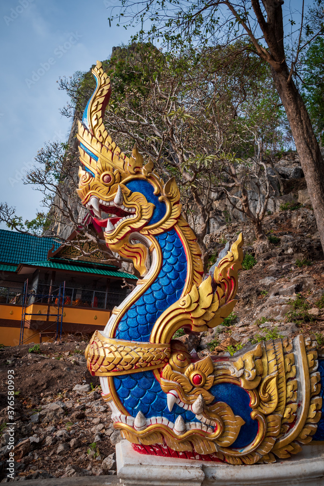 Beautiful serpent sculpture cement art with colorful Beautiful serpent sculpture cement art with colorful