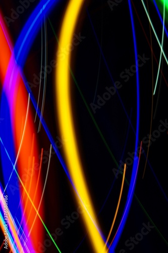 Abstract colorful background with minimalist light traces produced by slow shutter speed