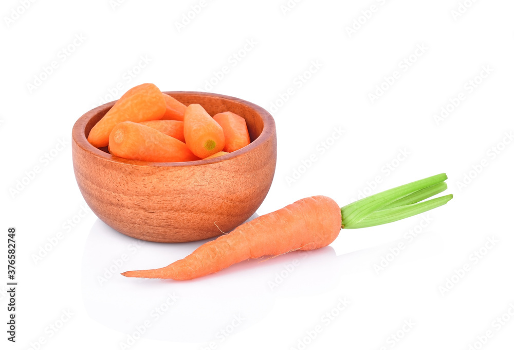 baby carrots in bowl isolated on white background.