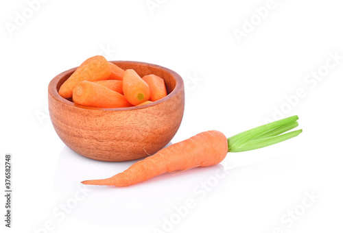Obraz na płótnie baby carrots in bowl isolated on white background. w salonie