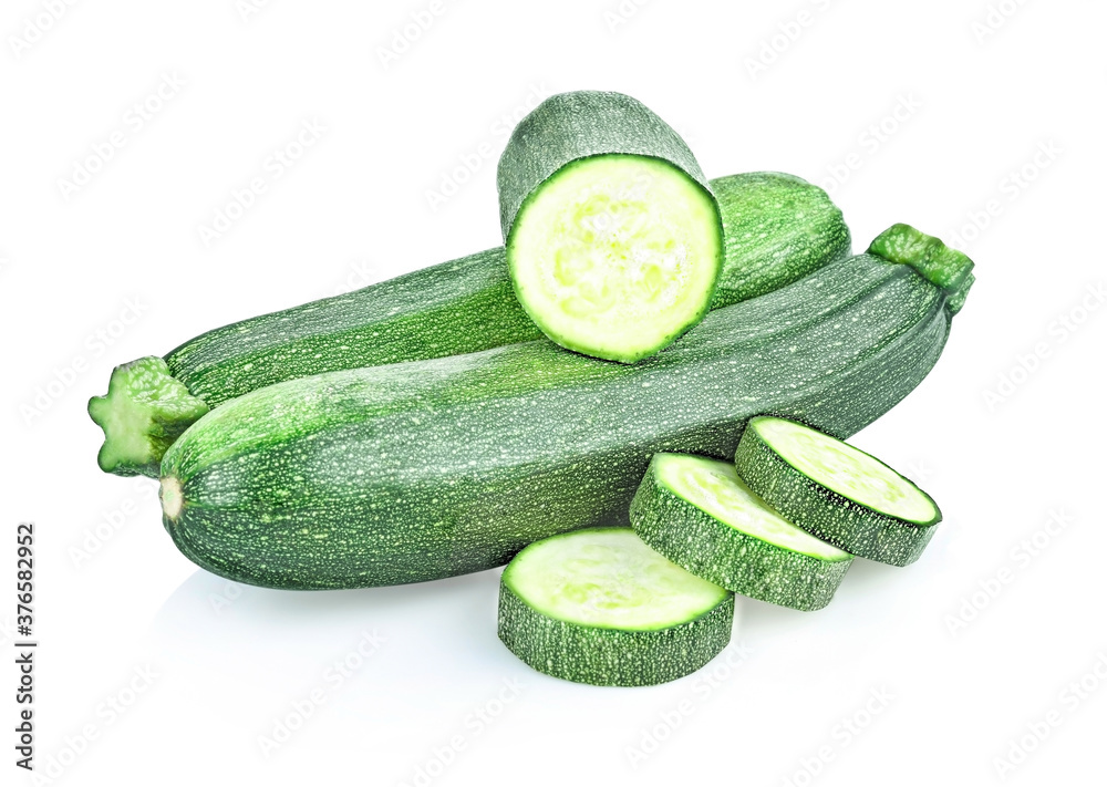 fresh green zucchini with slice isolated on white background.