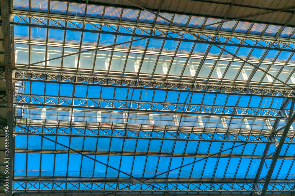 Obraz premium interior of greenhouse in garden with transparent glass roof.
