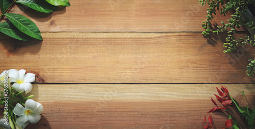Wooden planks, flowers, leaves on the wooden floor