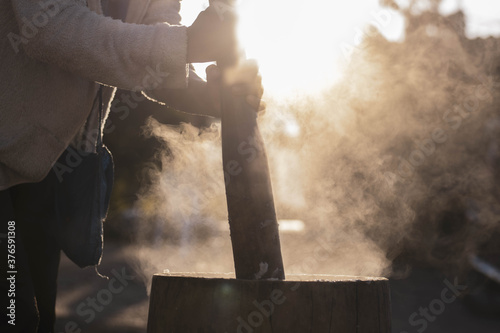 Slika na platnu A tribal tradition that runs once a year is pounding Pook rice to preserve the t