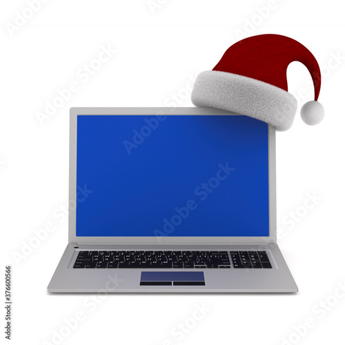 laptop and santa claus hat ...