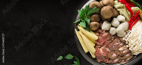 Japanese Sukiyaki in traditional Cast Iron Pot. Chabu sukiyaki, Japanese food. photo