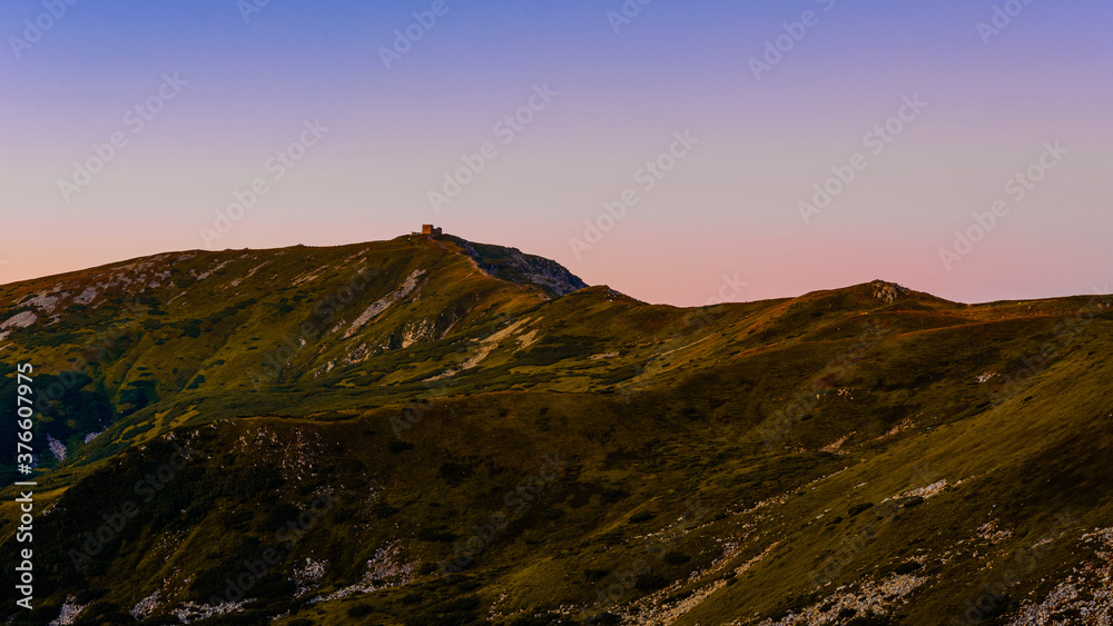 Obraz premium On the horizon you can see the White Elephant Observatory, sunrise near Mount Pip Ivan, breathtaking views of Montenegro.