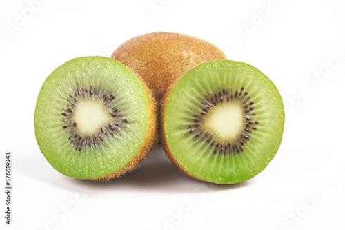 Slice of kiwi fruit and fresh kiwi on white background