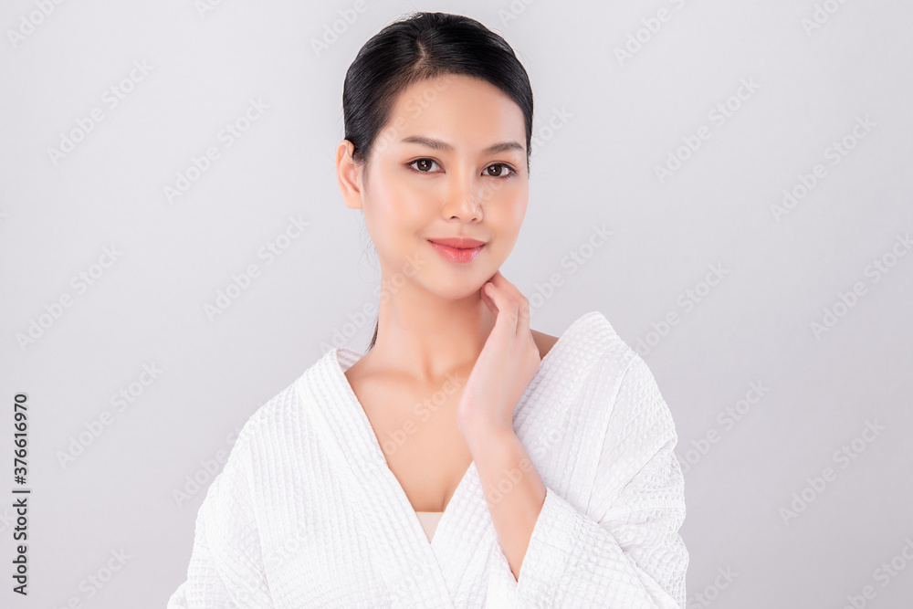 Beautiful Young asian Woman with Clean Fresh Skin on white background, Face care, Facial treatment, Cosmetology, beauty and spa, Asian women portrait Beautiful Young asian Woman with Clean Fresh Skin on white background, Face care, Facial treatment, Cosmetology, beauty and spa, Asian women portrait