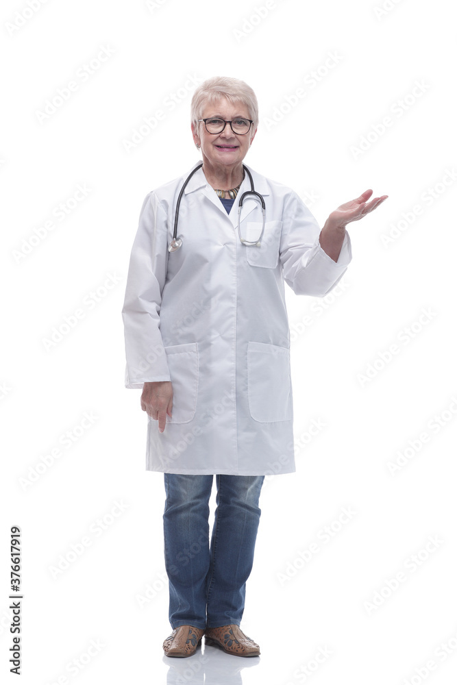 in full growth. Mature woman doctor showing on blank screen in full growth. Mature woman doctor showing on blank screen