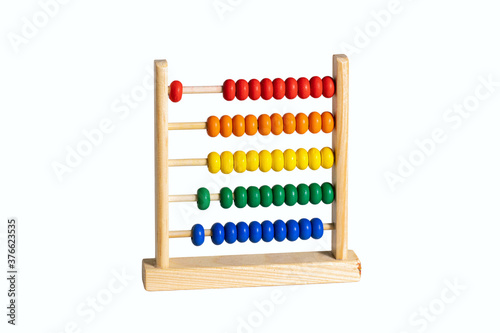 children toy rainbow wooden abacus isolated on white
