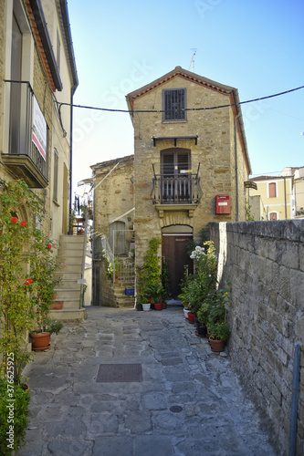 A small road crosses the old buildings of Pietrapertosa  a rural village in the Basilicata region  Italy.