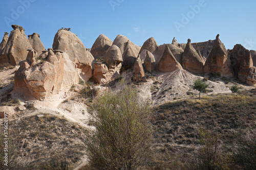 Natural landscape of Devrent Valley (Devrent Vadisi) or Imagination valley in Cappadocia, distinctive fairy chimneys, tall cone-shaped rock formations clustered in Monks Göreme- Kayseri, Turkey