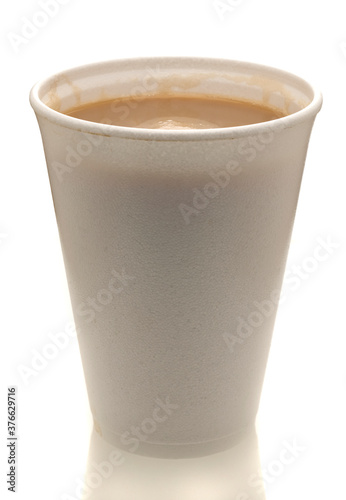 Hot drink in polystyrene cup on a white background