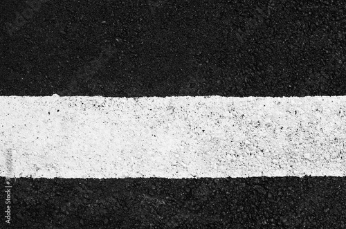 asphalt texture with a white line painted