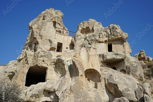 Exterior architecture design of 'Goreme valley Open-Air Museum' UNESCO world heritage site in Cappadocia with ancient cave churches and biblical frescoes- Turkey