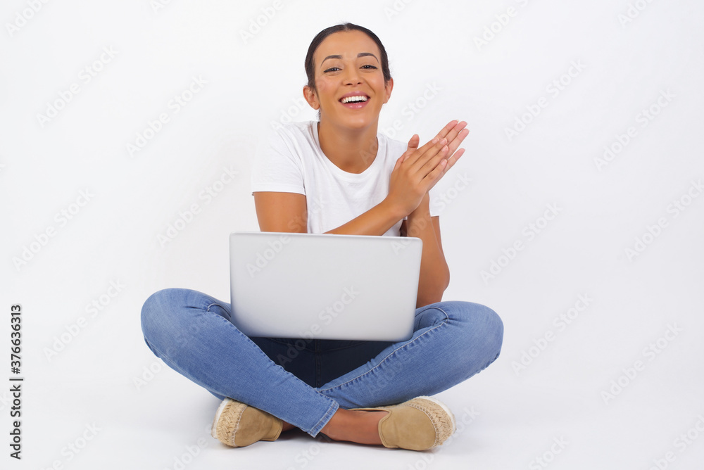 Young successful doctor man standing against yellow wall, feeling happy, smiling and clapping hands, saying congratulations with an applause. Young successful doctor man standing against yellow wall, feeling happy, smiling and clapping hands, saying congratulations with an applause.