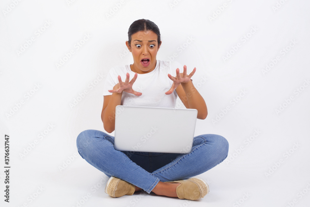 Dissatisfied female model frowns face, has disgusting expression, shows tongue, expresses non compliance, irritated with somebody, rejects do something. People and negative facial expressions Dissatisfied female model frowns face, has disgusting expression, shows tongue, expresses non compliance, irritated with somebody, rejects do something. People and negative facial expressions