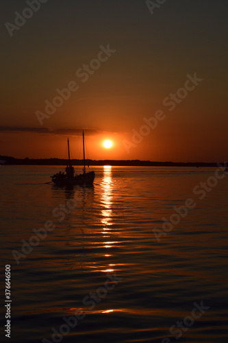 beautiful sunset on the lake, beautiful sunrise on the lake. © photoidea