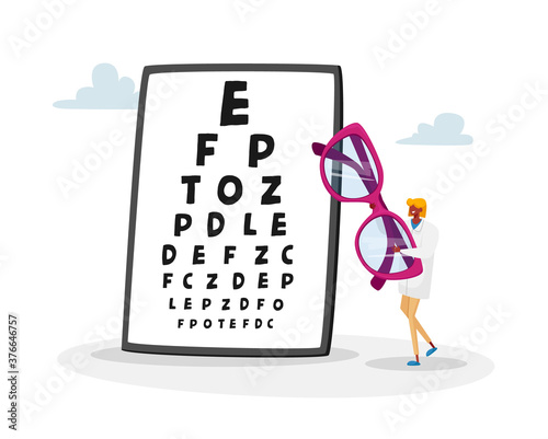 Tiny Female Doctor Carry Huge Eyeglasses front of Chart for Vision Checkup. Eyes Diseases Treatment and Diagnostics