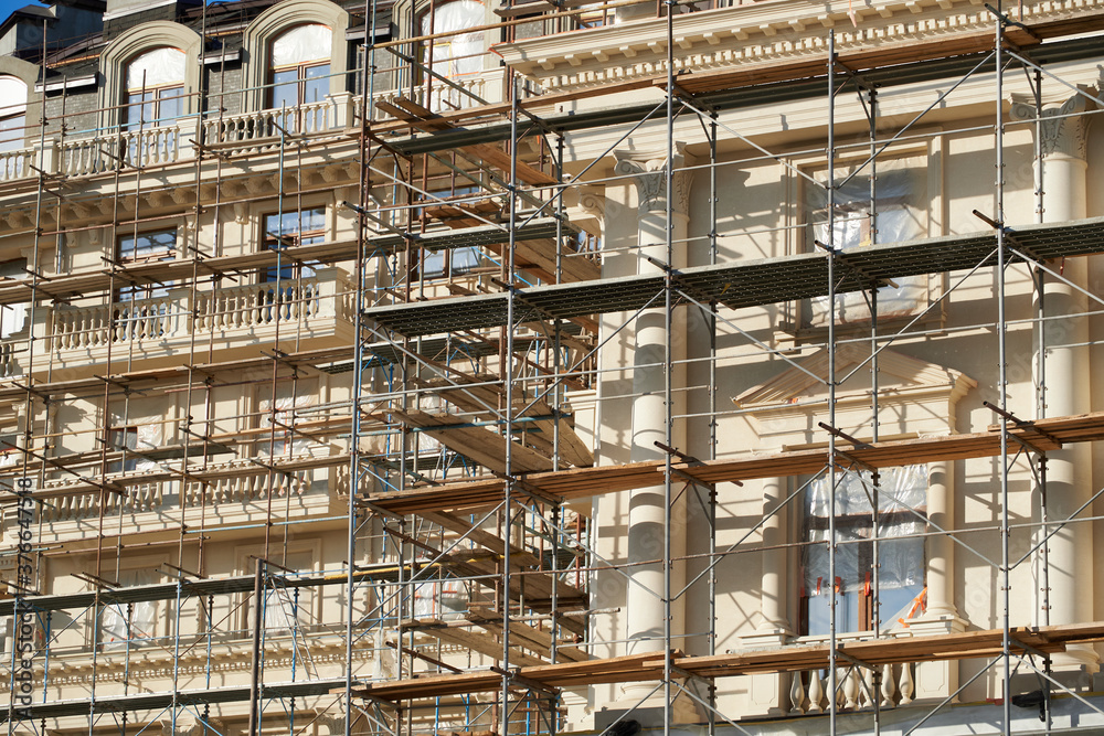 scaffolding and new building as background