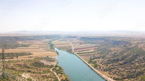 Aerial view of th agriculture fields and lake.