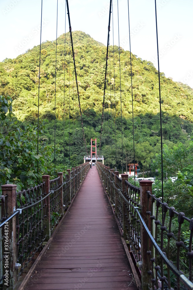Obraz premium A river with bridge in Wulai, Taiwan