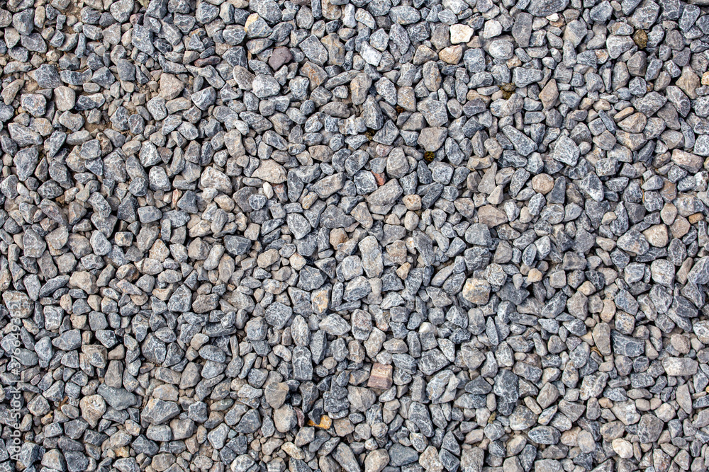 texture of gravel stones on ground background texture of gravel stones on ground background