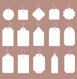 Large set of 15 blank white price tags or labels in assorted shapes with strings, colored vector illustration