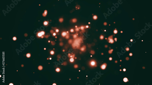 Festive abstract christmas texture, golden bokeh particles and highlights on dark background photo