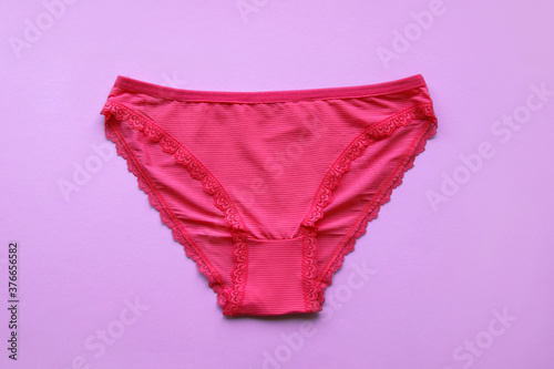 Set of women's panties on a pink background. Pink underwear.